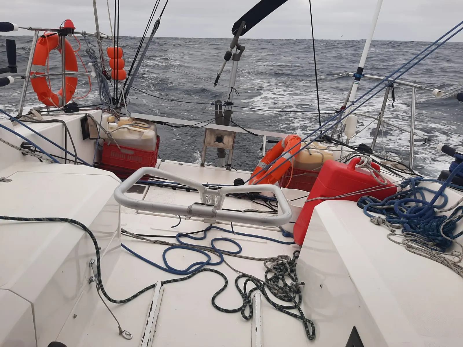 Rear perspective of a sailboat showing the vane gear integration