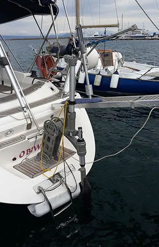 Extension tube raising the windvane for clearer airflow on a large ketch