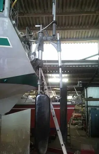 Detailed view of the safety pin and shear mechanism preventing damage