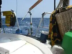 Yacht sailing autonomously while the crew rests below deck