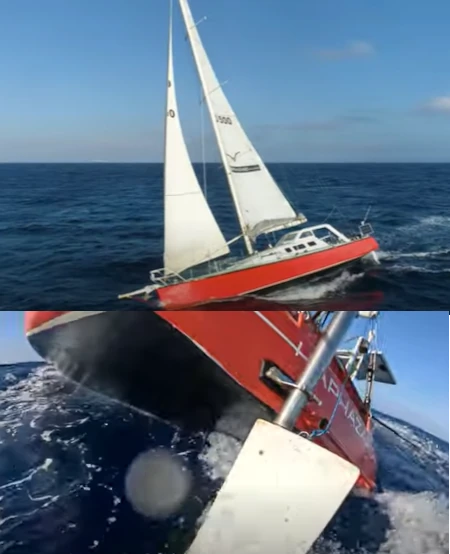Close up of an auxiliary rudder blade submersion in water